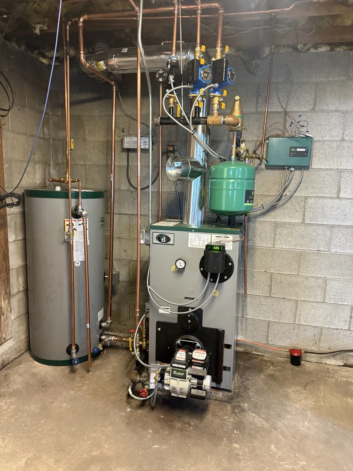 New Peerless oil boiler and Peerless Partner PP-60 indirect water heater installed by Top Shelf Plumbing and Heating
